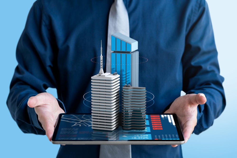 Edificios que sobresalen de una tablet